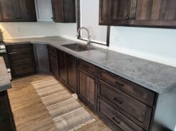 Kitchen with Maple Wood and Concrete Countertop